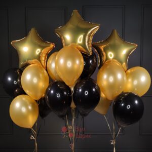 Композиция из воздушных шаров черных и золотых со звездами на 23е февраля